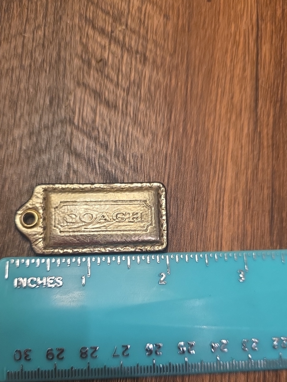 Coach Gold-Tone Leather Hang Tag